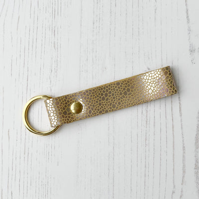 Picture of British-made sustainable holographic gold leather keyring with free personalisation - UK leather accessories