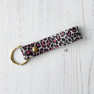 Picture of British-made sustainable  pink leopard print leather keyring with free personalisation - UK leather accessories
