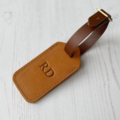 Picture of tan leather luggage tag, personalised luggage tag UK, personalised British leather luggage tag.