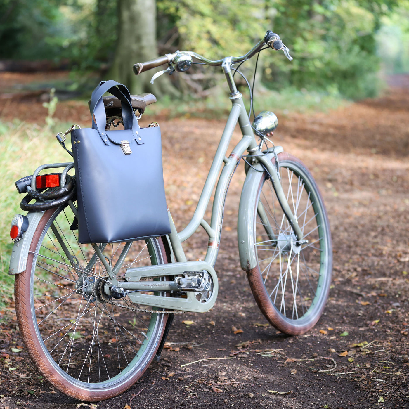 Picture of women's stylish bike bags in the style of a personalised red Trinity Shoulder bike bag