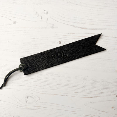Picture of British-made sustainable black leather bookmark with free personalisation, personalised leather gifts UK, black bookmark 