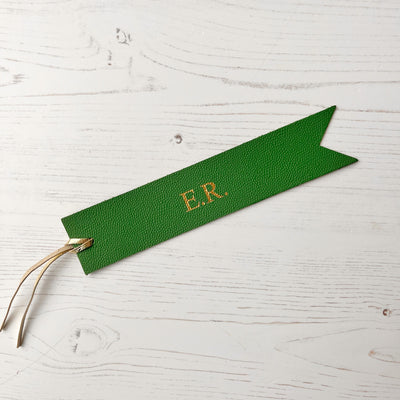 Picture of British-made sustainable bright green leather bookmark with free personalisation, personalised leather gifts UK, bright green bookmark 