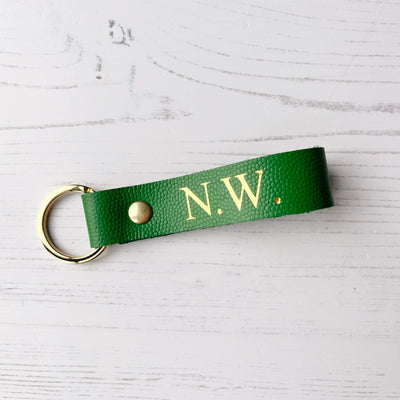 Picture of British-made sustainable bright green leather keyring with free personalisation, personalised leather gifts UK, bright green keyring 