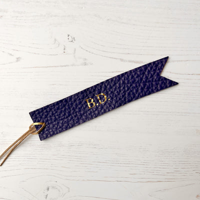Picture of British-made sustainable indigo leather bookmark with free personalisation, personalised leather gifts UK, indigo bookmark 