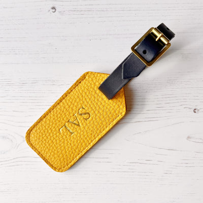 Picture of mustard yellow  leather luggage tag, personalised luggage tag UK, personalised British leather luggage tag.