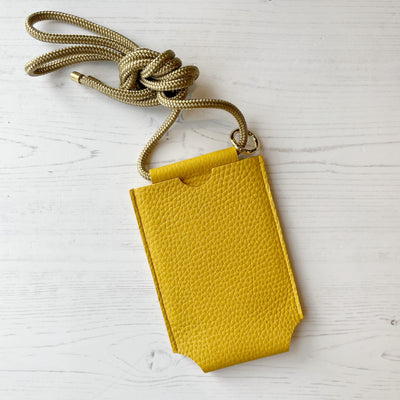 Picture of mustard yellow personalised leather phone bag , women's crossbody phone bag UK, personalised phone bags UK
