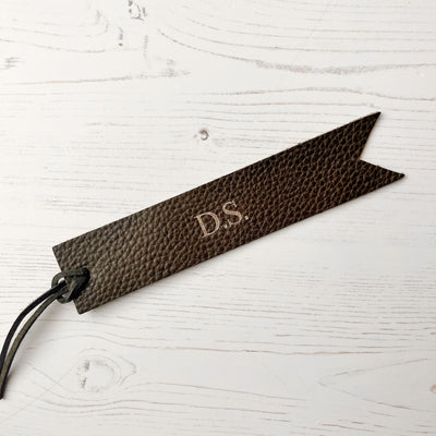 Picture of British-made sustainable olive green leather bookmark with free personalisation, personalised leather gifts UK, olive green bookmark 