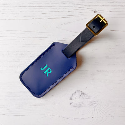 Picture of royal blue  leather luggage tag, personalised luggage tag UK, personalised British leather luggage tag.