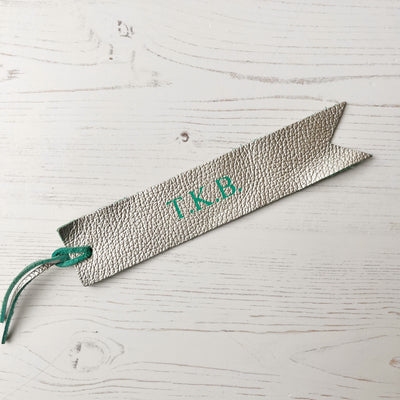 Picture of British-made sustainable silver leather bookmark with free personalisation, personalised leather gifts UK, silver bookmark 