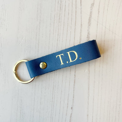 Picture of British-made sustainable cobalt blue leather keyring with free personalisation, personalised leather gifts UK, cobalt blue keyring 