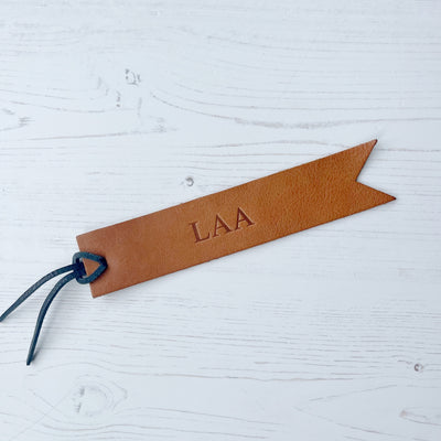 Picture of British-made sustainable tan leather bookmark with free personalisation, personalised leather gifts UK, tan bookmark 