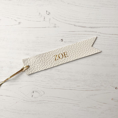 Picture of British-made sustainable white leather bookmark with free personalisation, personalised leather gifts UK, white bookmark 