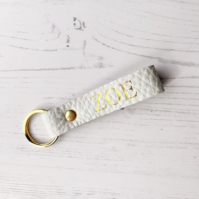 Picture of British-made sustainable white leather keyring with free personalisation, personalised leather gifts UK, white keyring 