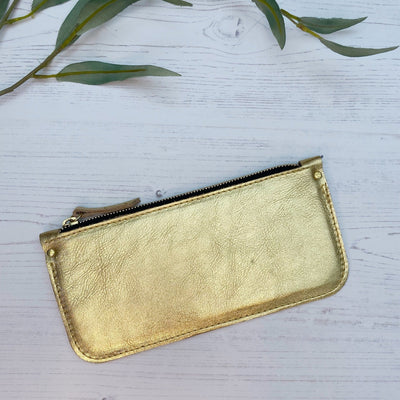 Picture of handmade personalised leather clutch purse UK in gold