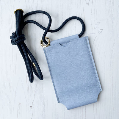 Picture of pale blue personalised leather phone bag , women's crossbody phone bag UK, personalised phone bags UK