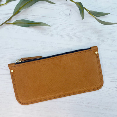 Picture of handmade personalised leather clutch purse UK in tan